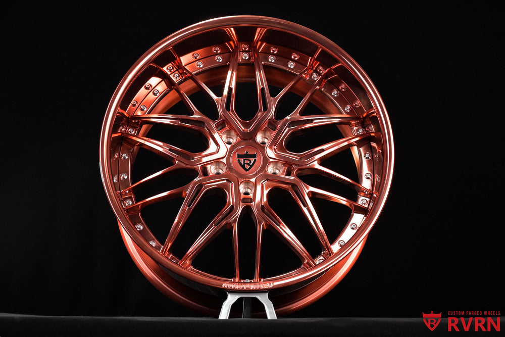 Custom deep dish wheels for a Chevy Impala SS, RVRN RV-T081 forged design with an all polished rose gold finish, 22x9 and 22x11