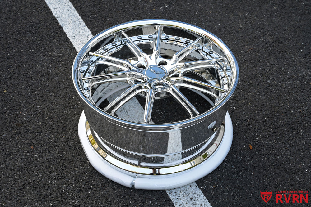 Lightweight RVRN DC05 forged chrome wheel with precise machining and smooth surface finish.