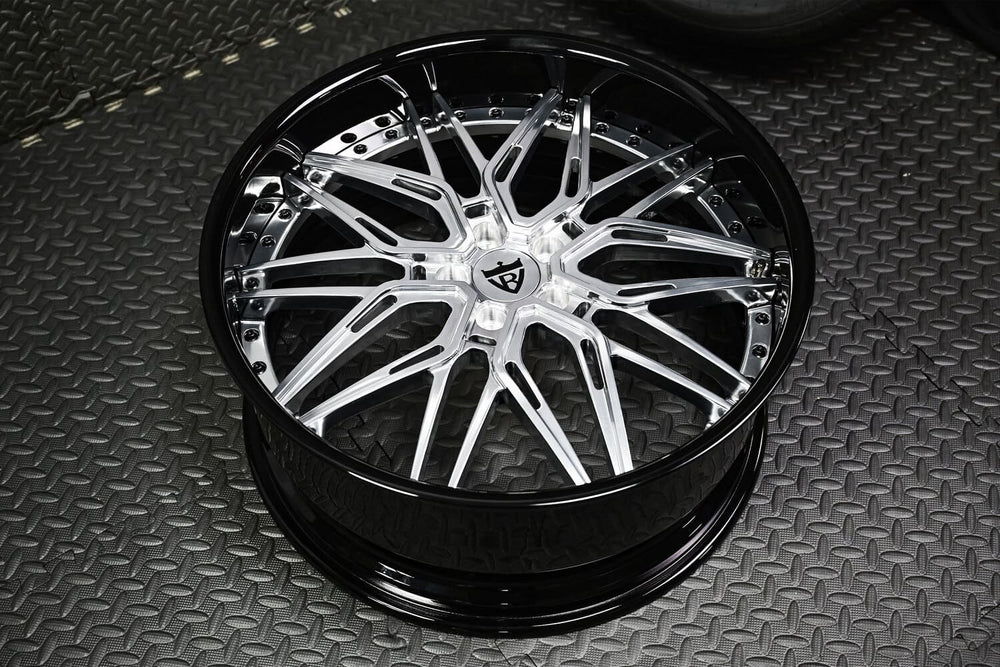 Close-up of polished aluminum spoke on Bentley custom RV-T081 wheel