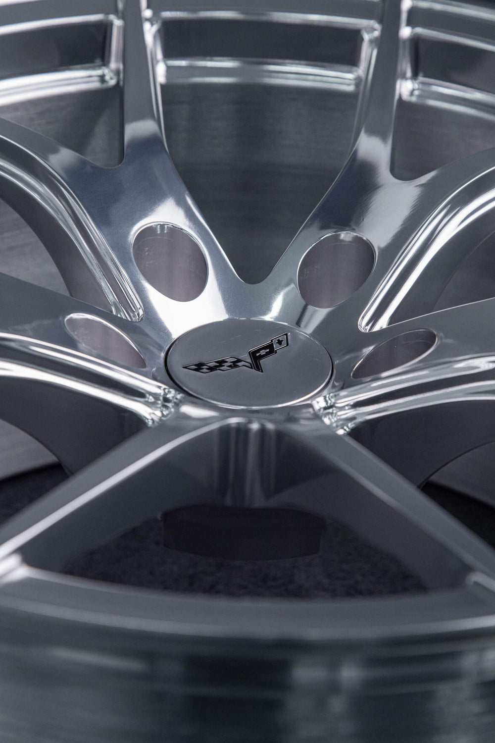 Center hub and bolt detail on polished RV-MC24 C5 Corvette wheels.