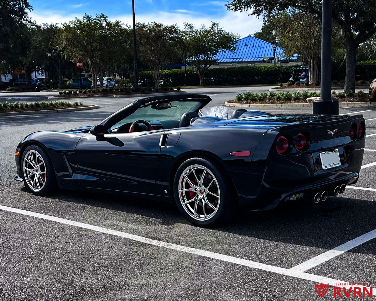 2007 Corvette C6 convertible on RVRN RV-MC24 1-piece forged wheels in chrome with staggered 18x8.5 front and 19x10 rear flush fitment, rear three-quarter view.