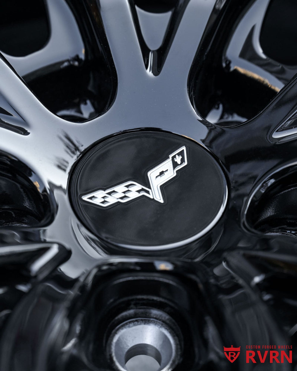 Gloss black forged wheels on C6 Corvette showing brake clearance and fitment precision
