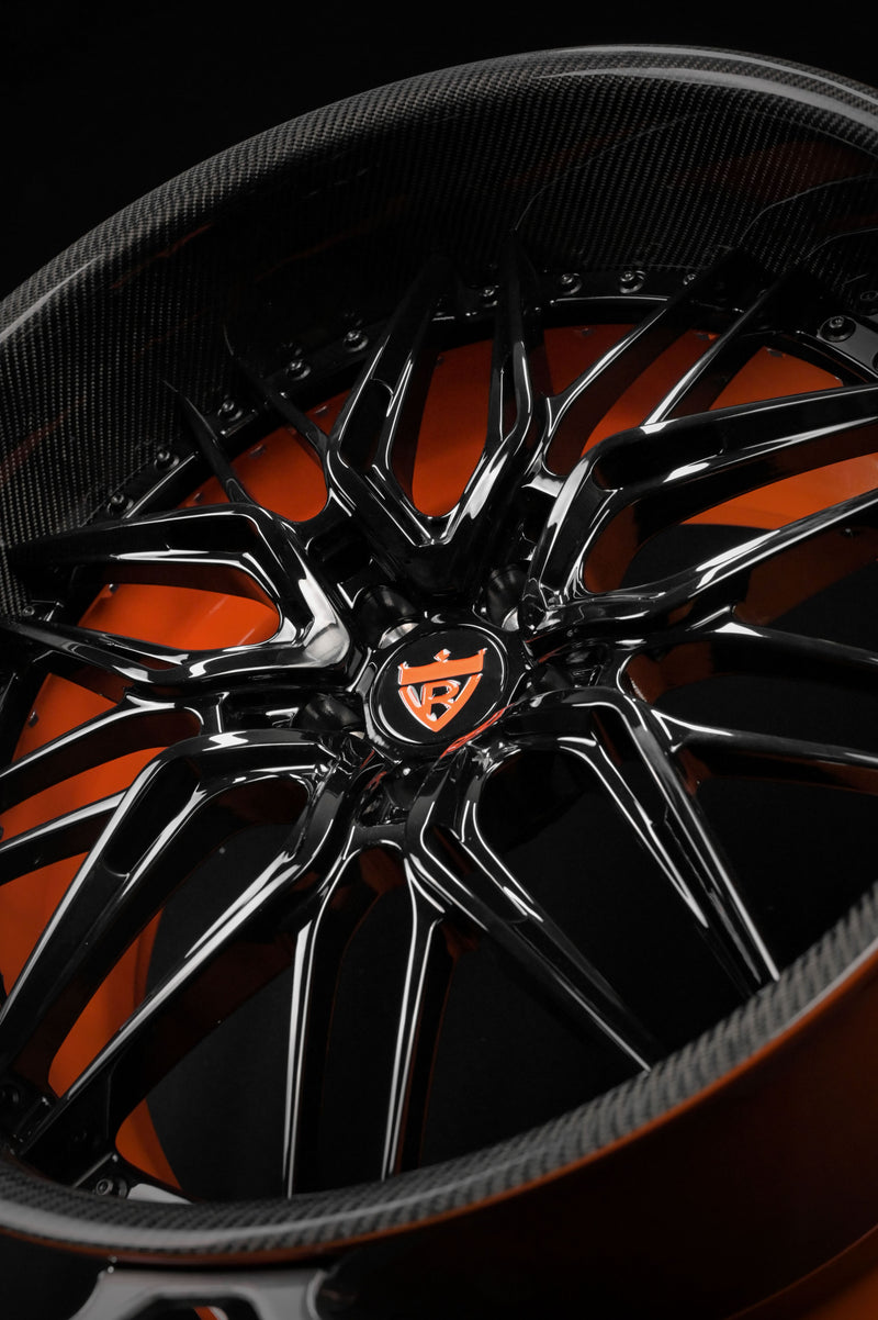 Bentley Continental custom wheels with orange inner and outer barrel plus carbon fiber wrapped lip
