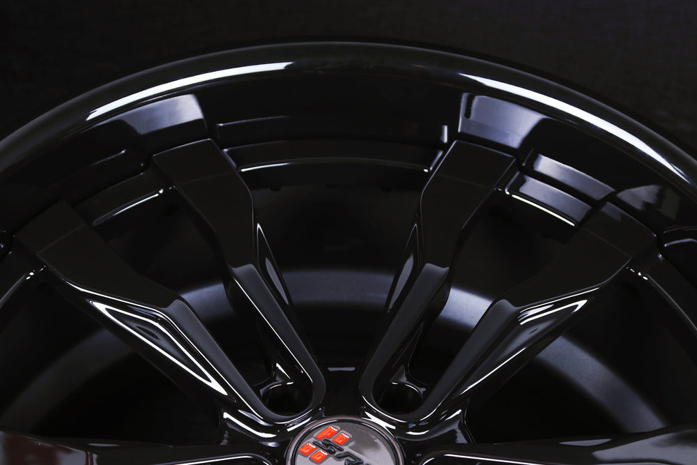 Top-down studio detail of deep dish rim lip and split-spoke transition on RVRN RV-DR88 custom forged wheel.