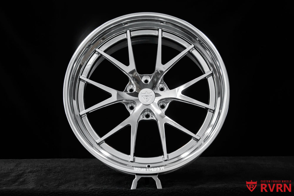 Close-up of RVRN RV-DC23 Cadillac Escalade custom Y spoke polished wheels designed for a clean luxury performance appearance.