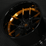 2013 Dodge Challenger copper black custom forged RVRN wheel with intricate design against a textured black backdrop