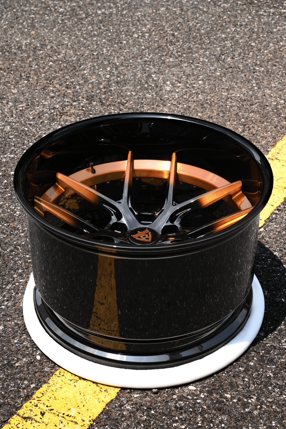 2013 Dodge Challenger copper black custom forged RVRN wheel displayed on asphalt.