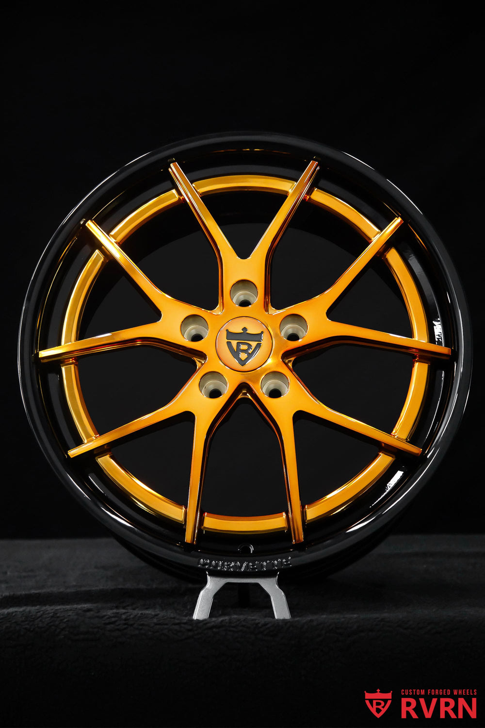 Close-up of RVRN RV-DC24 Corvette C7 wheels showing polished bronze Y-spokes against a gloss black barrel, sized 18x8.5 front and 19x10 rear