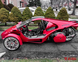 Side profile of a 2014 Campagna T-Rex 16S on RVRN RM-01 deep dish chrome custom forged wheels with 18x8 front and 22x11 rear fitment.