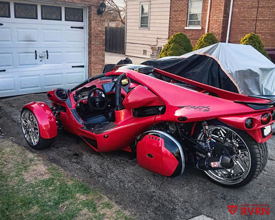Rear three-quarter view of a 2014 Campagna T-Rex 16S fitted with RVRN RM-01 deep dish chrome custom forged wheels.