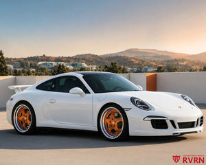 2014 Porsche 911 Carrera 4S on RVRN RV-DP04 2-piece deep dish custom forged wheels in Transparent Bronze Spoke with Brushed Barrel and Polished Lip, front three-quarter view.