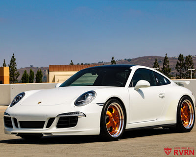 2014 Porsche 911 Carrera 4S on RVRN RV-DP04 custom forged wheels, front view showing the transparent bronze spokes.