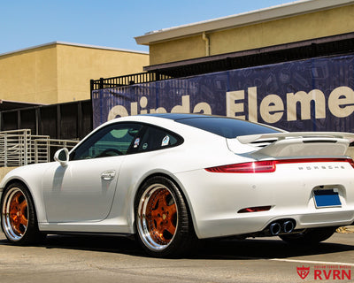 2014 Porsche 911 Carrera 4S on RVRN RV-DP04 custom forged wheels, front wheel close-up with transparent bronze spoke finish.