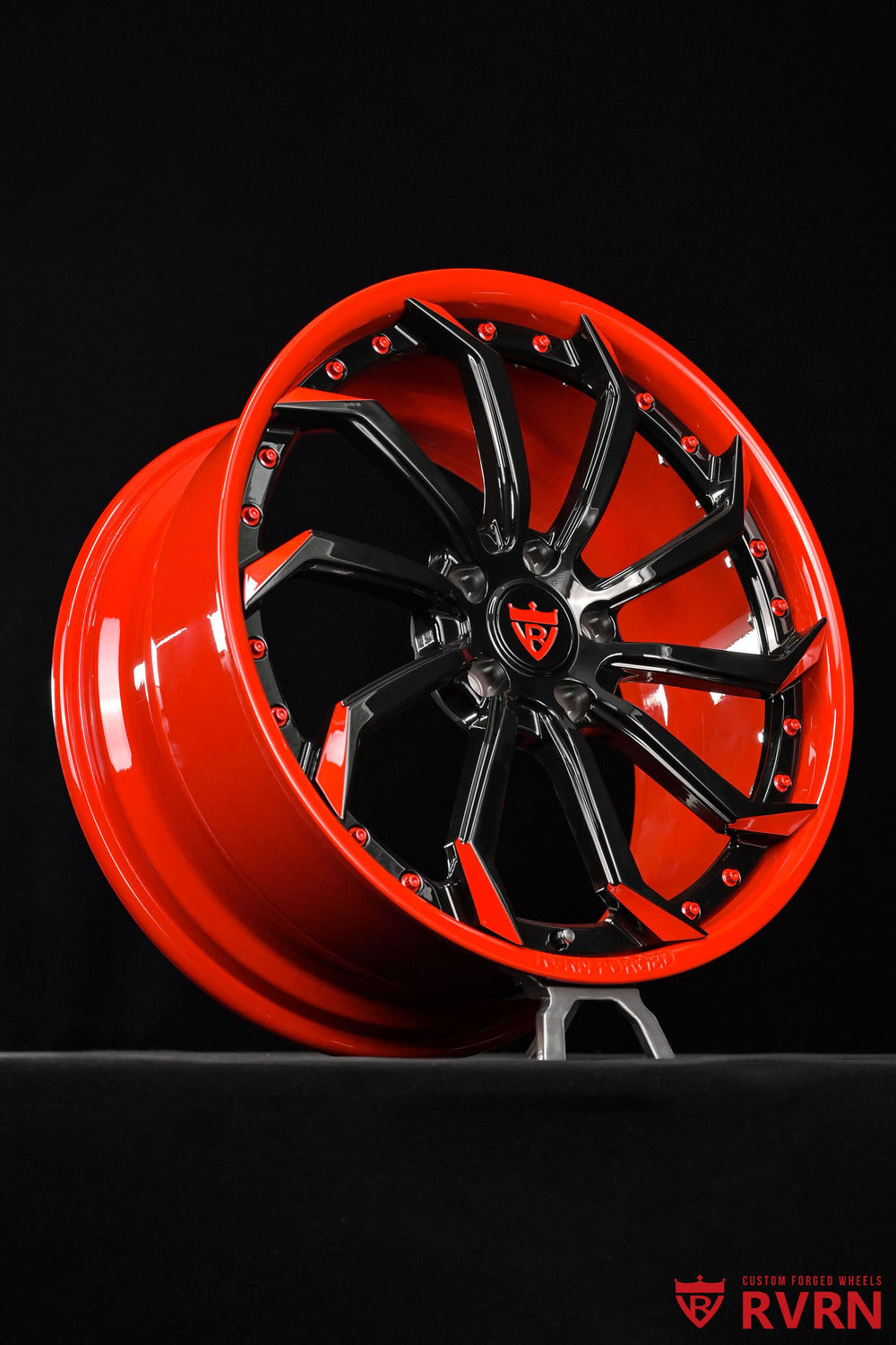 RVRN RV-DC01 C7 Stingray wheels featuring a custom red barrel and red and black directional spokes in 19x8.5 and 20x10 fitment