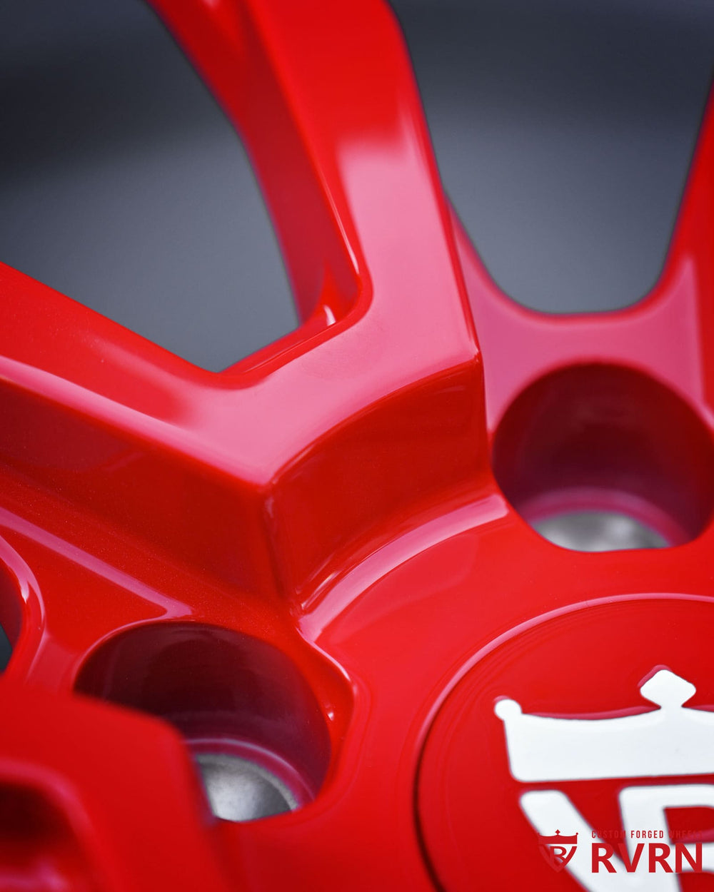 Detailed view of gloss red spokes on RV-MG122 Corvette C7 Stingray forged wheels with precision machined Y spoke design.