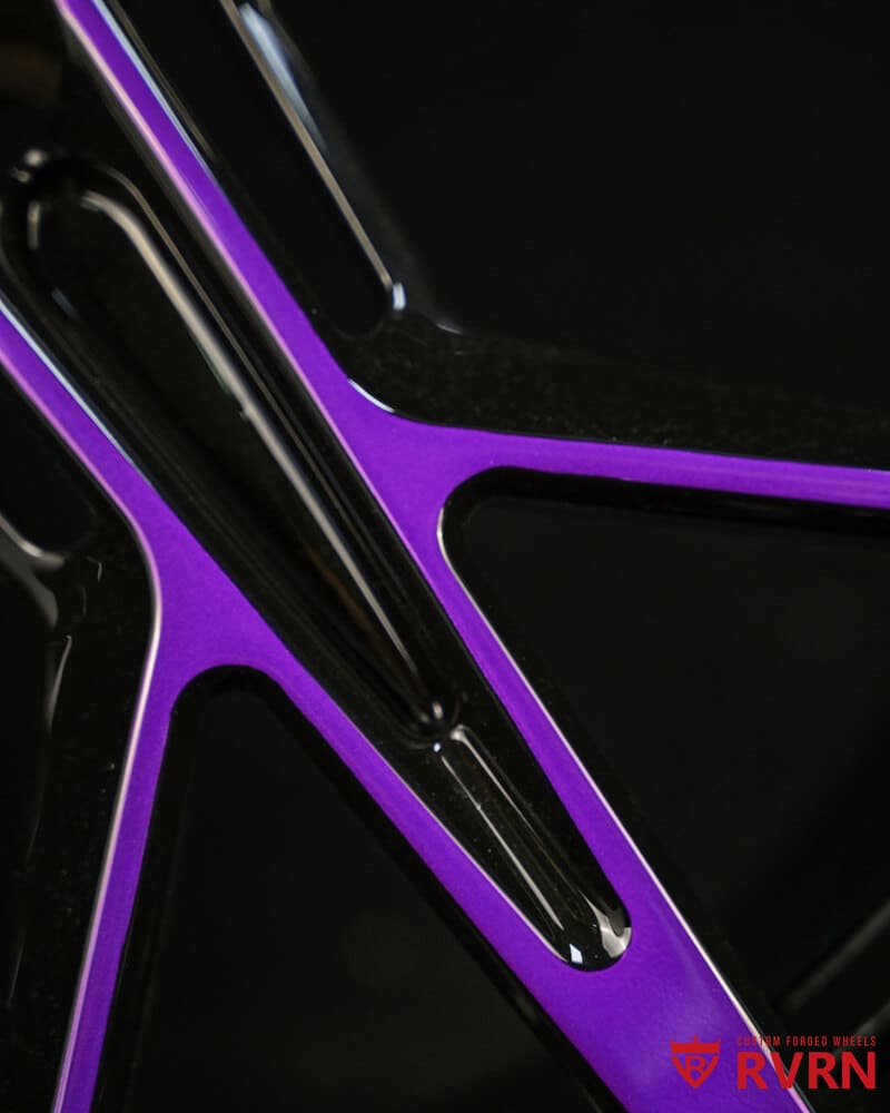 Purple and black C7 Corvette aftermarket wheels by RVRN from rear view