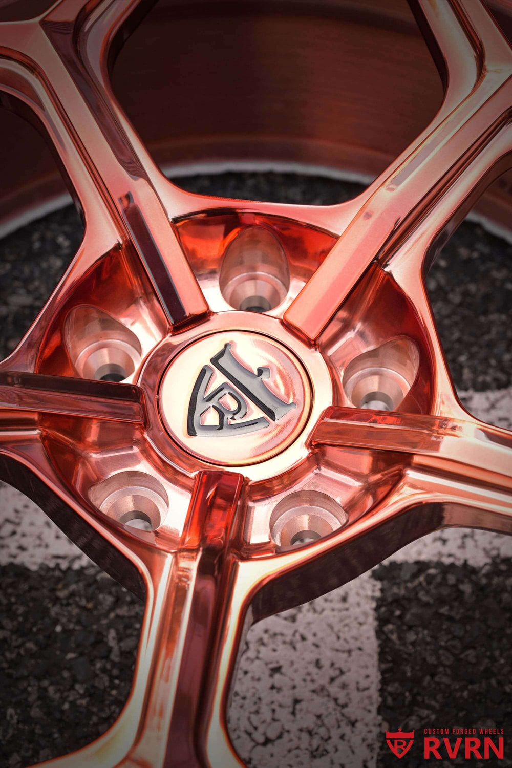 Front three-quarter view of a 2015 Jeep Wrangler Sport on RVRN RV-MC491 Y-spoke forged wheels in polished rose gold, 20x8.5 +15MM