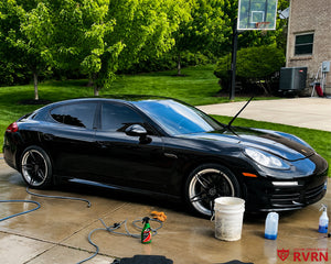 2015 Porsche Panamera 4 on RVRN RV-MR02 custom forged wheels, detail front view showing the 5-split-spoke design and polished lip.