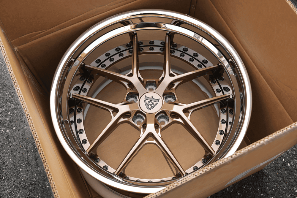 Close-up of the chrome finish and purple bronze accents on RV-DR08D wheels for BMW M5