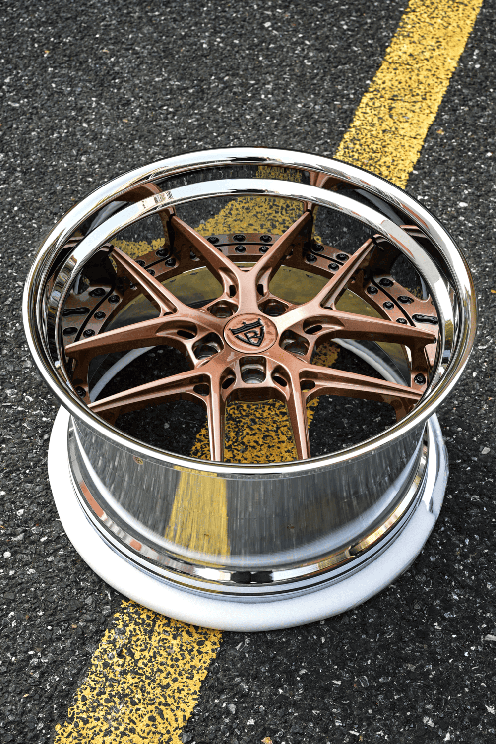 Front angle view of deep dish chrome & gloss purple bronze forged wheels on 2016 BMW M5