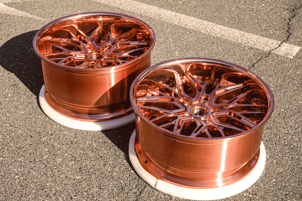 	Front angle view of custom 2016 Camaro SS rose gold 20x10 forged wheel by RVRN