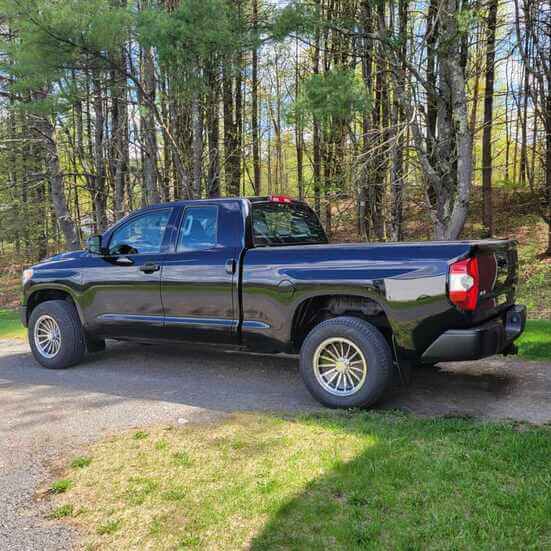 	Profile view of Toyota truck fitted with custom forged wheels