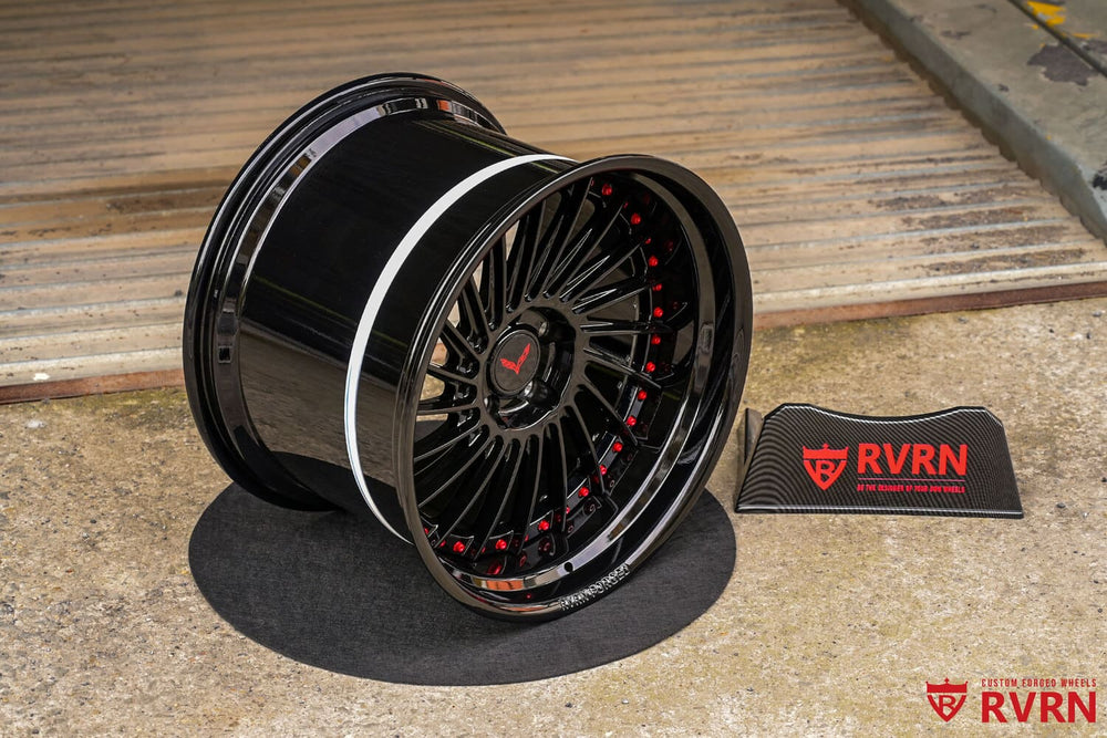 Gloss black RVRN RV-DN01 forged wheel with RVRN Red screws beside the RVRN sign, custom wheels for the 2016 Corvette C7 Base Widebody
