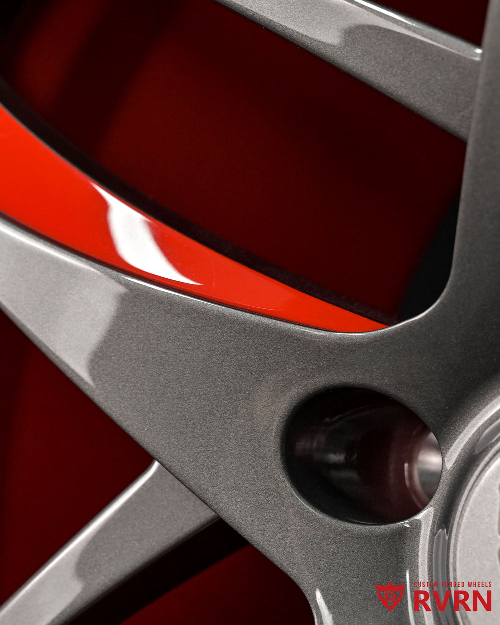 Forged monoblock wheels for Corvette Z06 featuring custom red and shark gray finish with staggered sizing