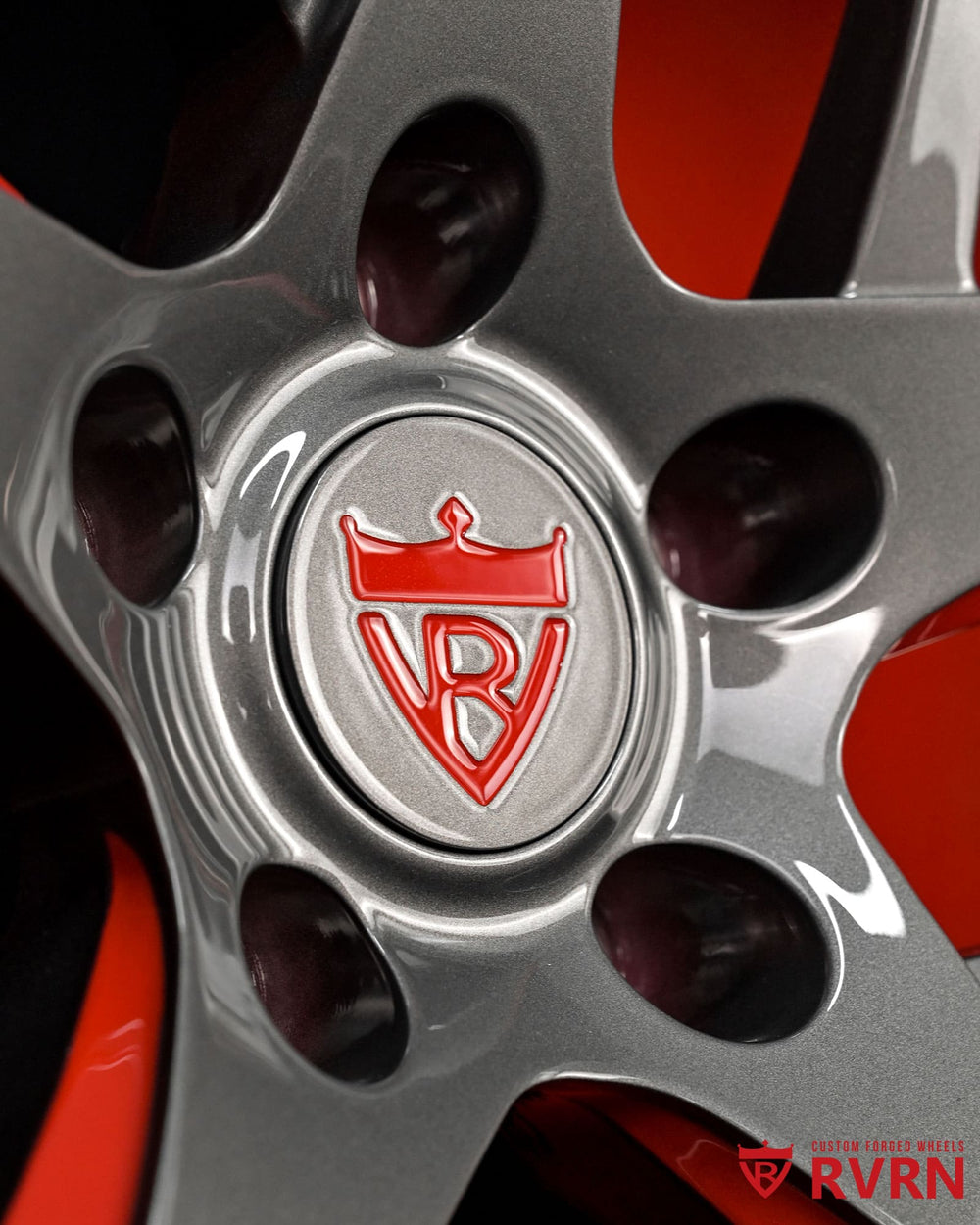 Custom red and gray Corvette C7 wheels featuring one-piece forged construction and performance-oriented fitment