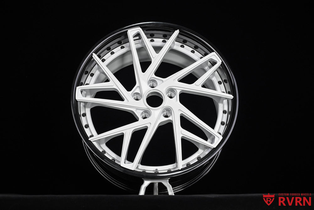 Gloss black barrel and ivory white spoke combination on RVRN DS74 wheel.