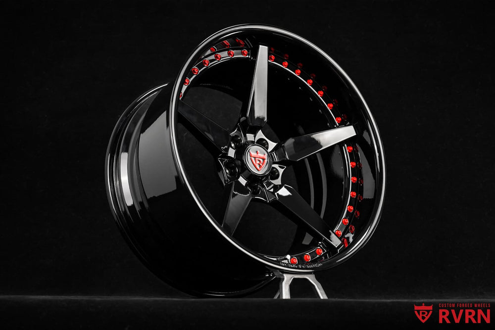 Close-up of RVRN red screws on forged deep lip Charger wheels