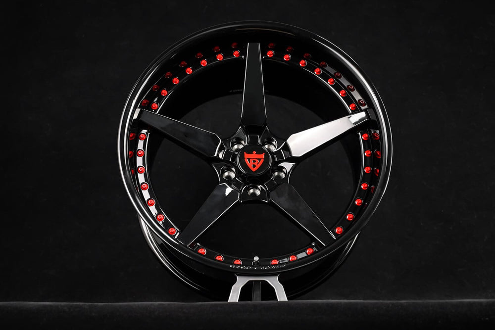Close-up of RVRN red screws on forged deep lip Charger wheels