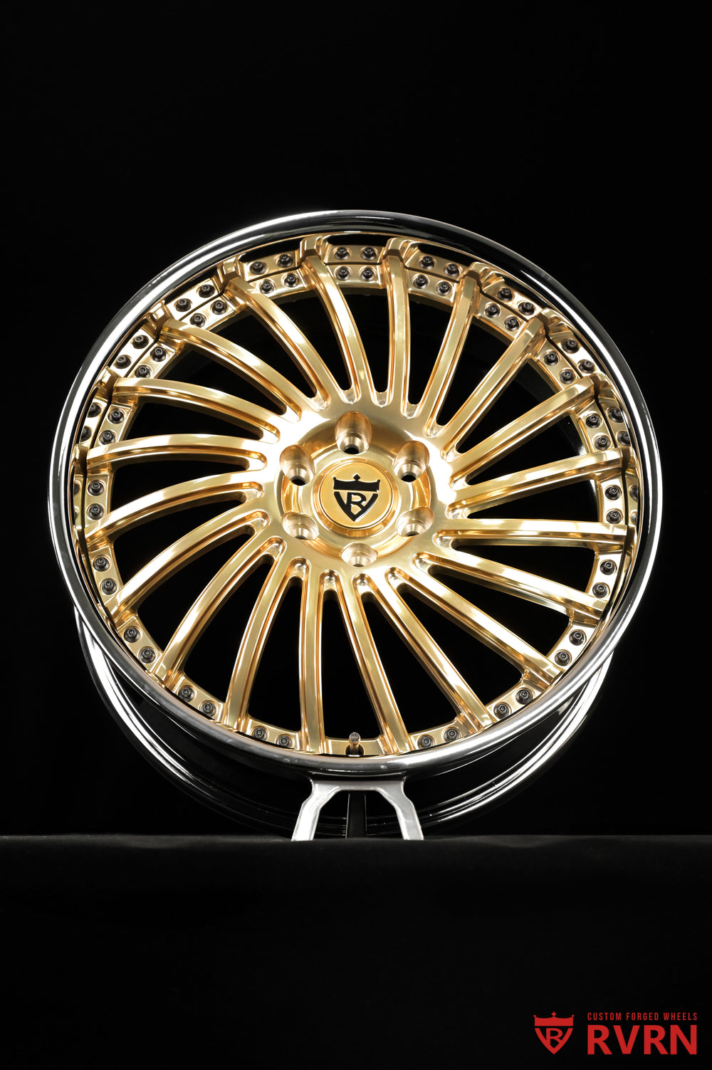 Front three-quarter view of RVRN RV-DN01 2-piece directional GMC Arcadia wheels in polished frozen gold with chrome barrel, custom forged 20x8.5 +35MM.