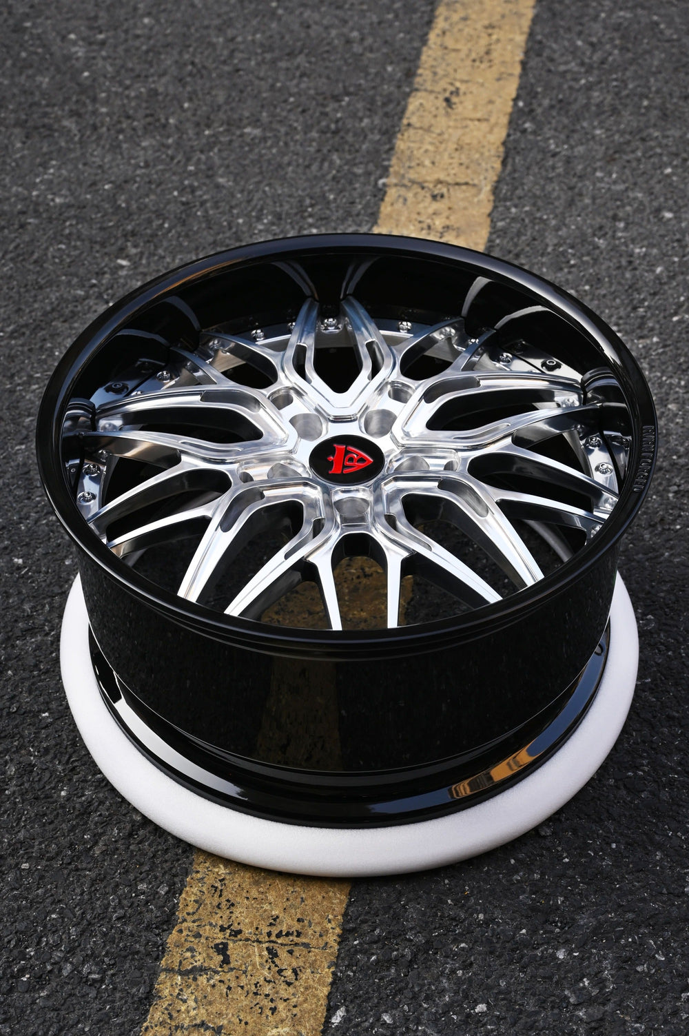 Top view of the RVRN RV-T081 deep dish forged wheel showing the polished multi-spoke face and glossy black outer lip.