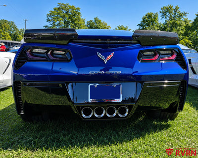 2017 Corvette C7 Grand Sport rear view on RVRN RV-DC04 chrome forged wheels with carbon fiber spoiler and quad exhaust tips.