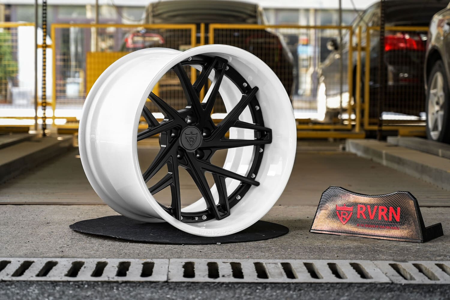 Close-up of 20x13 rear deep lip, matte black spoke and pearl white barrel