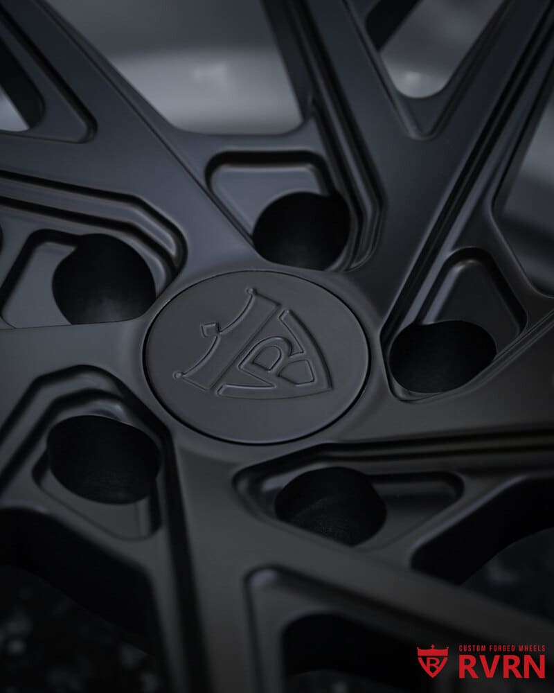 Close-up of 20x13 RV-DS74 Mustang wheels with custom white hardware