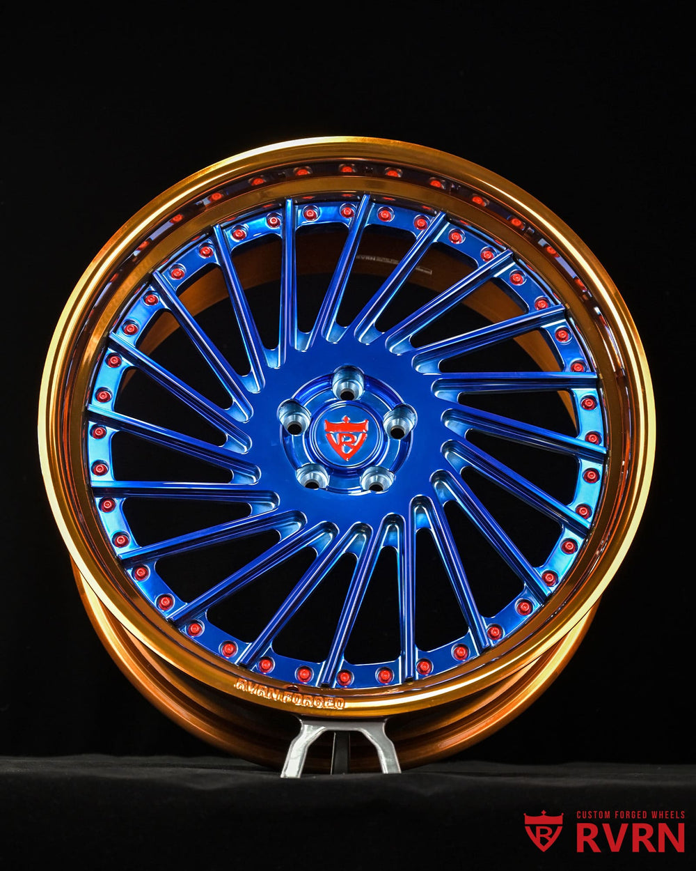 Angled detail of RV-DN01 custom forged wheels, 2018 Vanderhall Venice, polished blue and bronze finish.