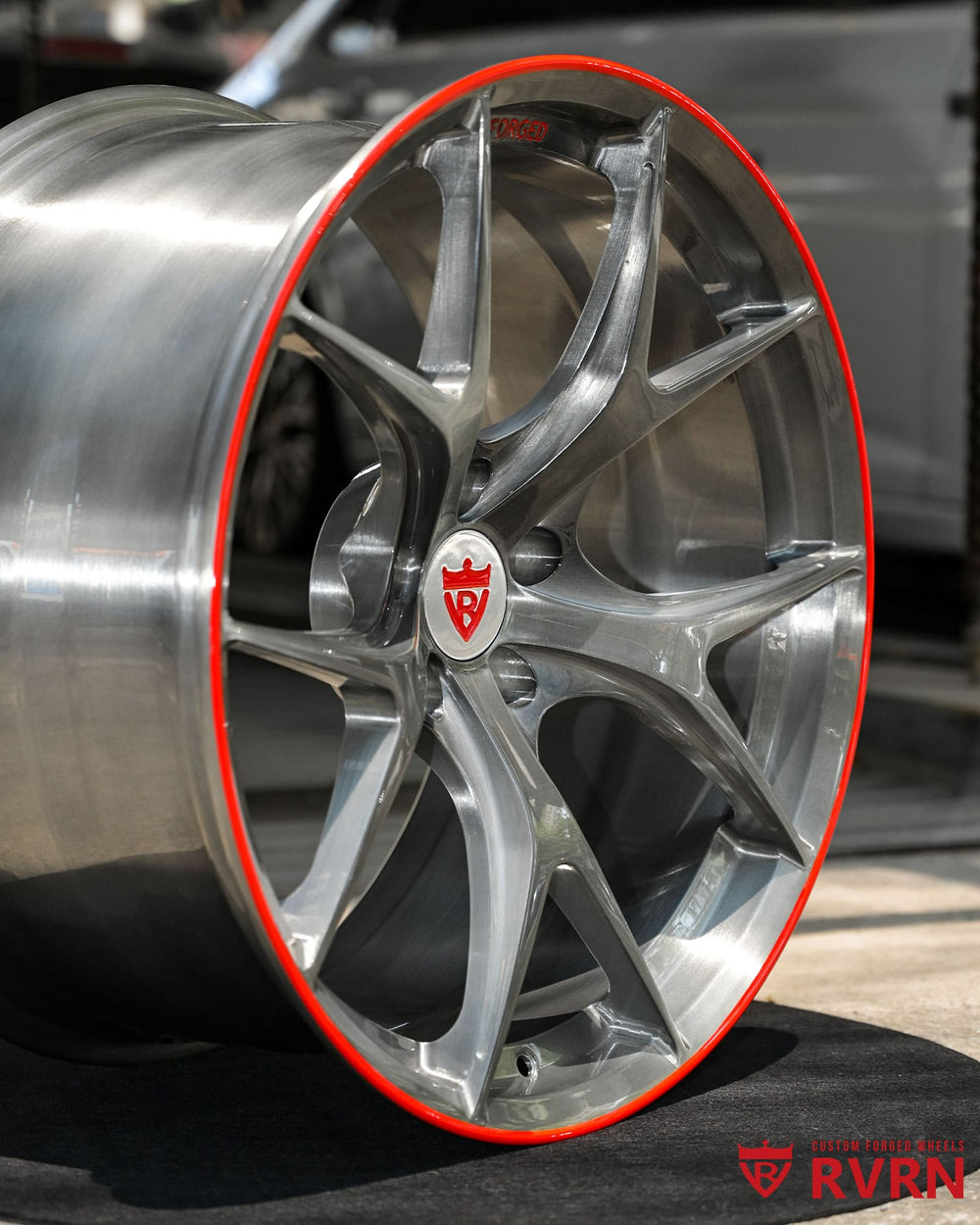 Transparent gunmetal grey Audi wheels with matte red trim designed for high performance RS5 applications