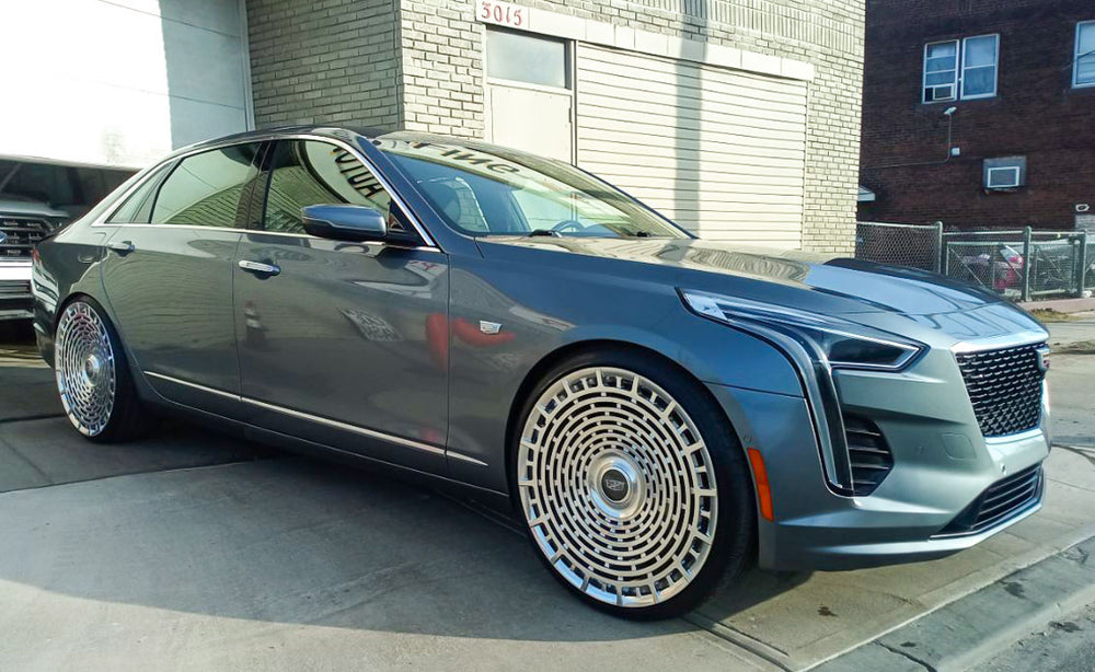 Side view of brushed aluminum RV-MD02 custom wheel on CT6