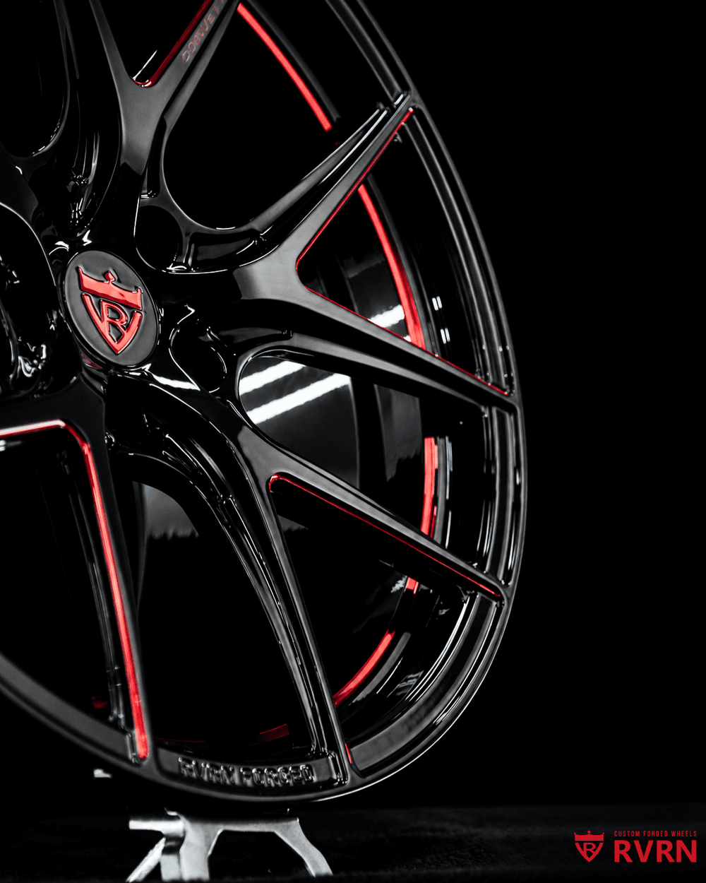 Black and red wheels for Corvette C7 Grand Sport featuring custom forged one-piece construction and aggressive Y spoke styling.