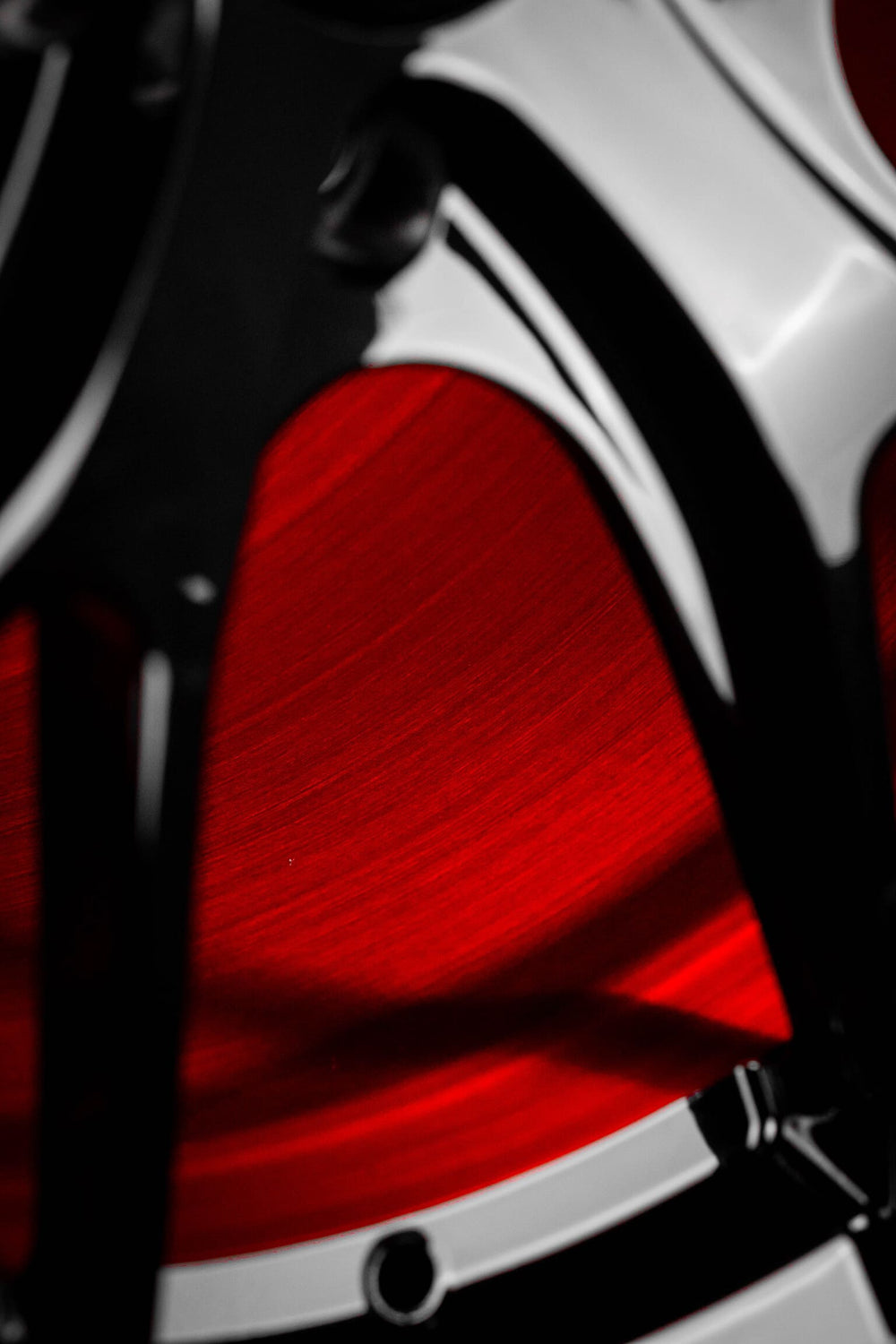 Close-up of Corvette C7 Grand Sport gloss black forged wheels.