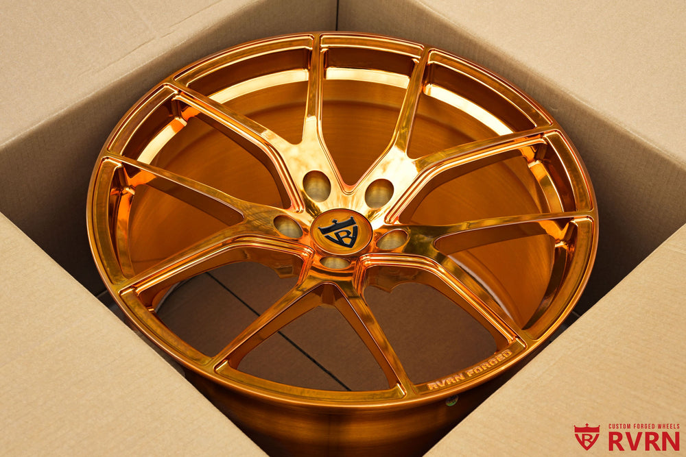 Close front view of a 2019 Corvette C7 Z06 with a 19x10 RVRN RV-MC24 polished bronze Y-spoke forged wheel.