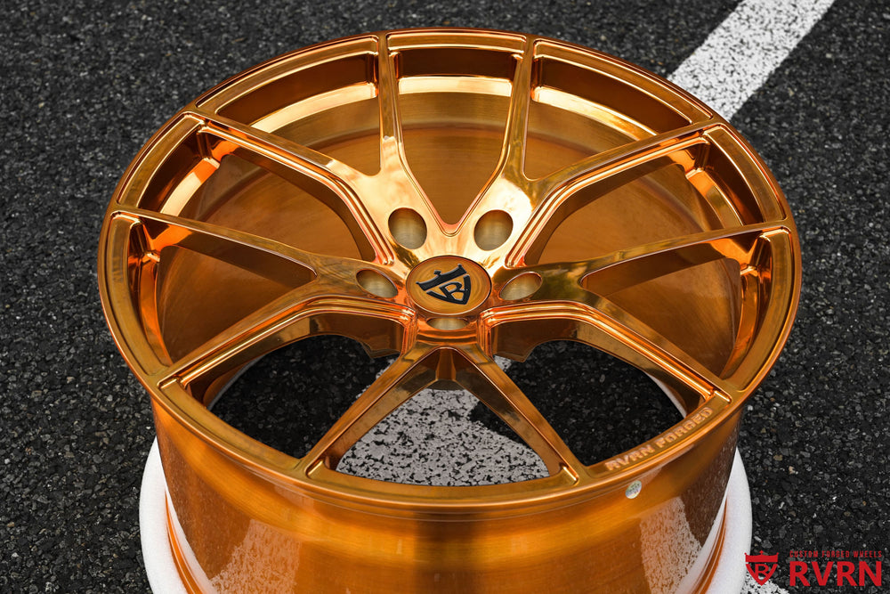 Front three-quarter view of a 2019 Corvette C7 Z06 on RVRN RV-MC24 polished bronze Y-spoke forged wheels, 19x10 front and 20x12 rear.