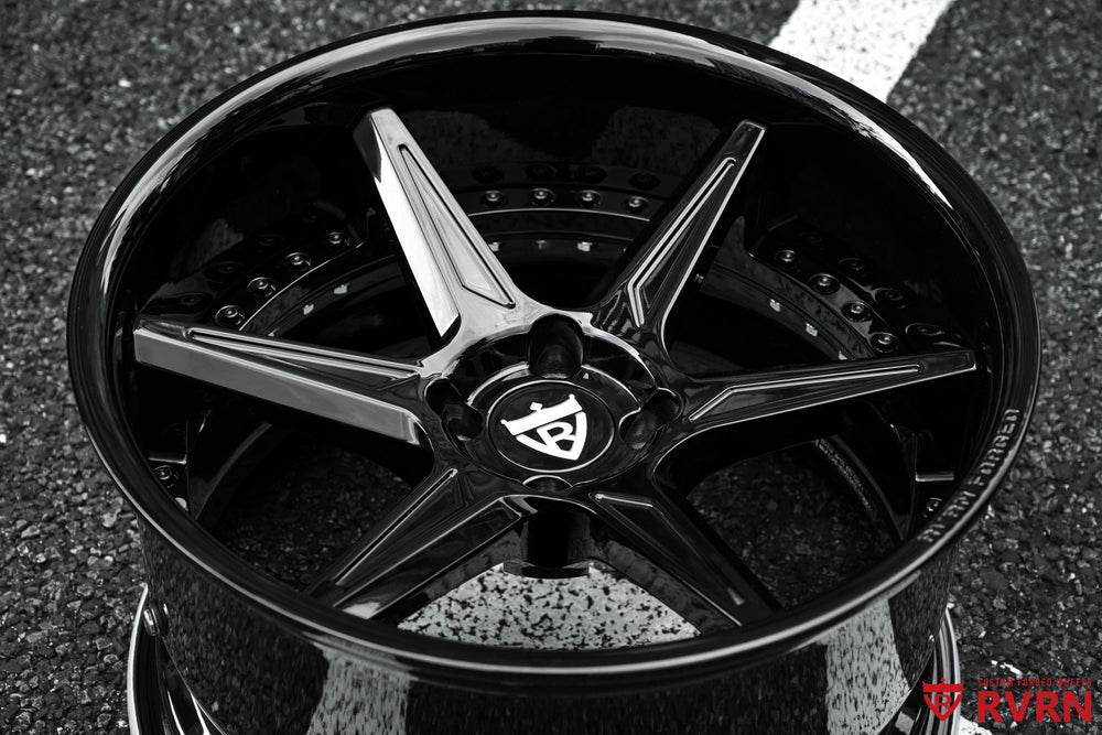 Front view of RVRN RV-DC19 black custom wheels for a Mazda MX-5, featuring a concave 6-spoke 2-piece forged design in 17x8.5 +13MM