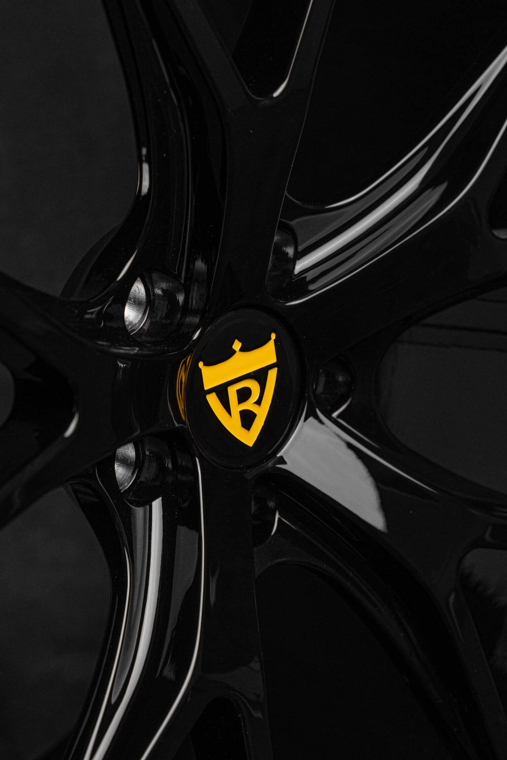 	Detail view of custom black finish on AMG GT wheels