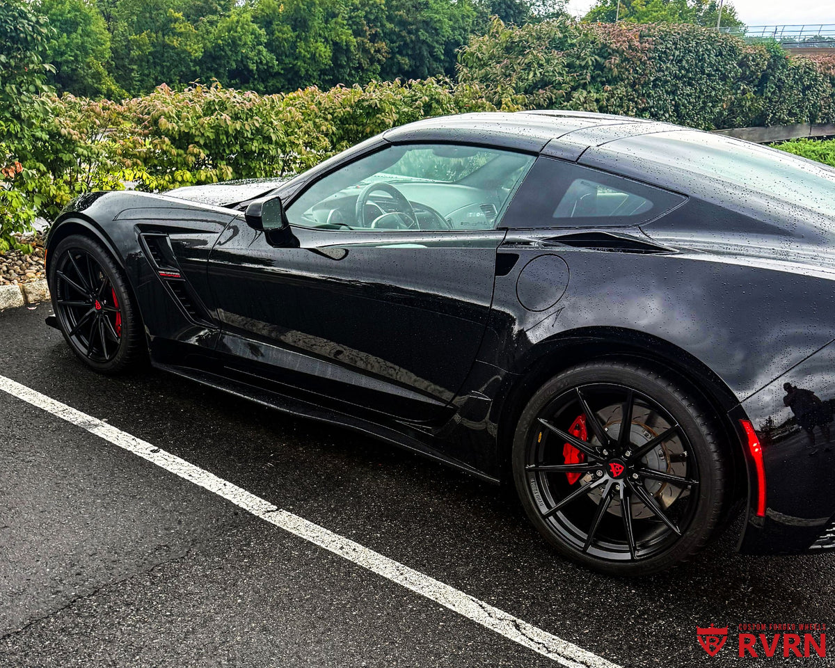 2019 Corvette C7 Grand Sport on RVRN RV-MJ02 10-spoke custom forged wheels in Satin Black finish, front three-quarter view with 19x10 front and 20x12 rear staggered fitment.