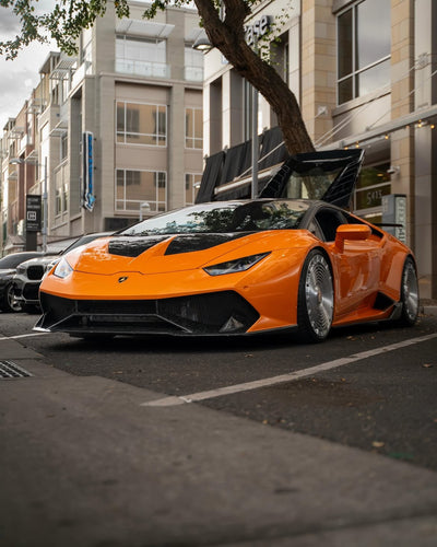 2019 Lamborghini Huracan LP-580 on RVRN RV-MD02 full face custom forged wheels in Brushed Aluminum finish, front three-quarter view at High Street event, Gilbert Arizona.
