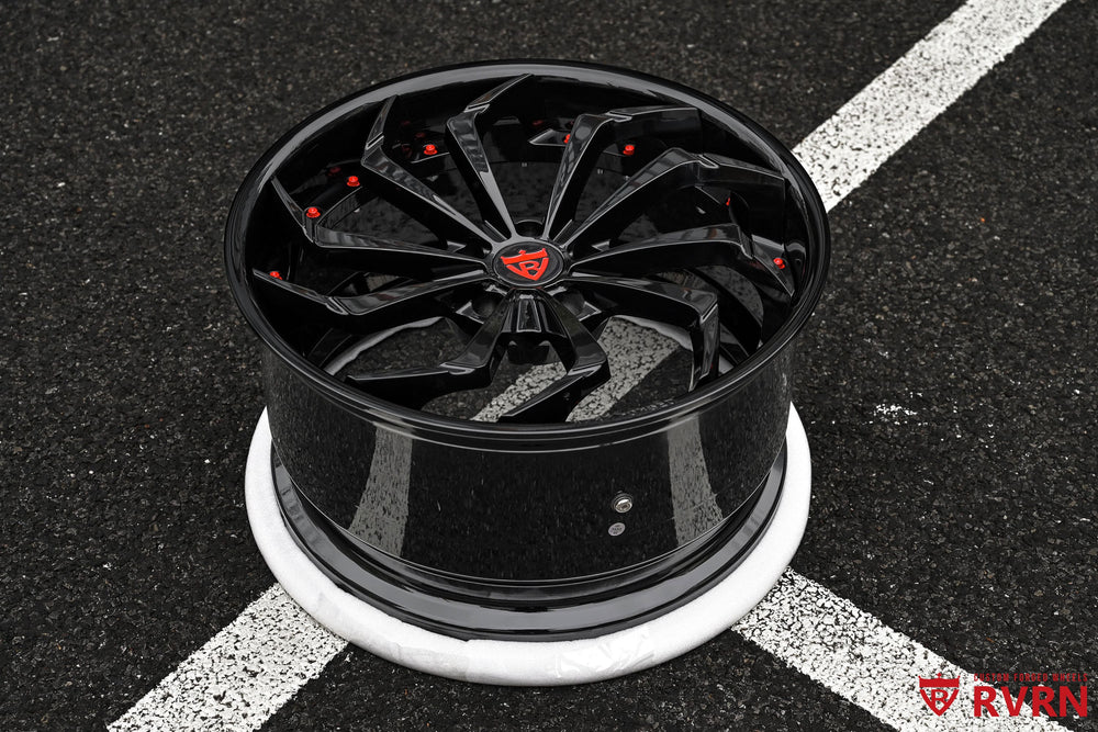Custom Corvette C8 Stingray wheels RV-DC06 with all gloss black finish, red hardware and directional wheel design