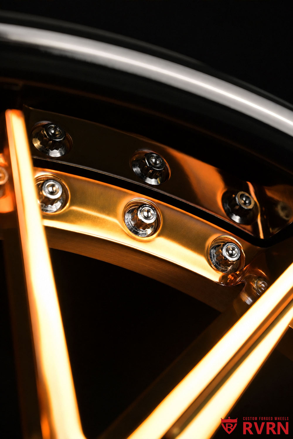 Close-up product view of RVRN RV-T081 polished bronze wheels for a 2020 Corvette C8 Z51, featuring a gloss black barrel and custom staggered fitment.